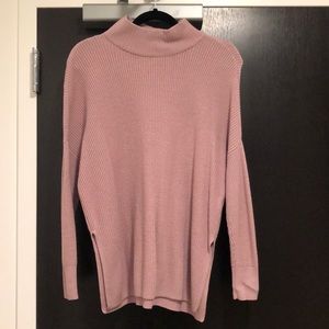 Pink turtleneck sweater